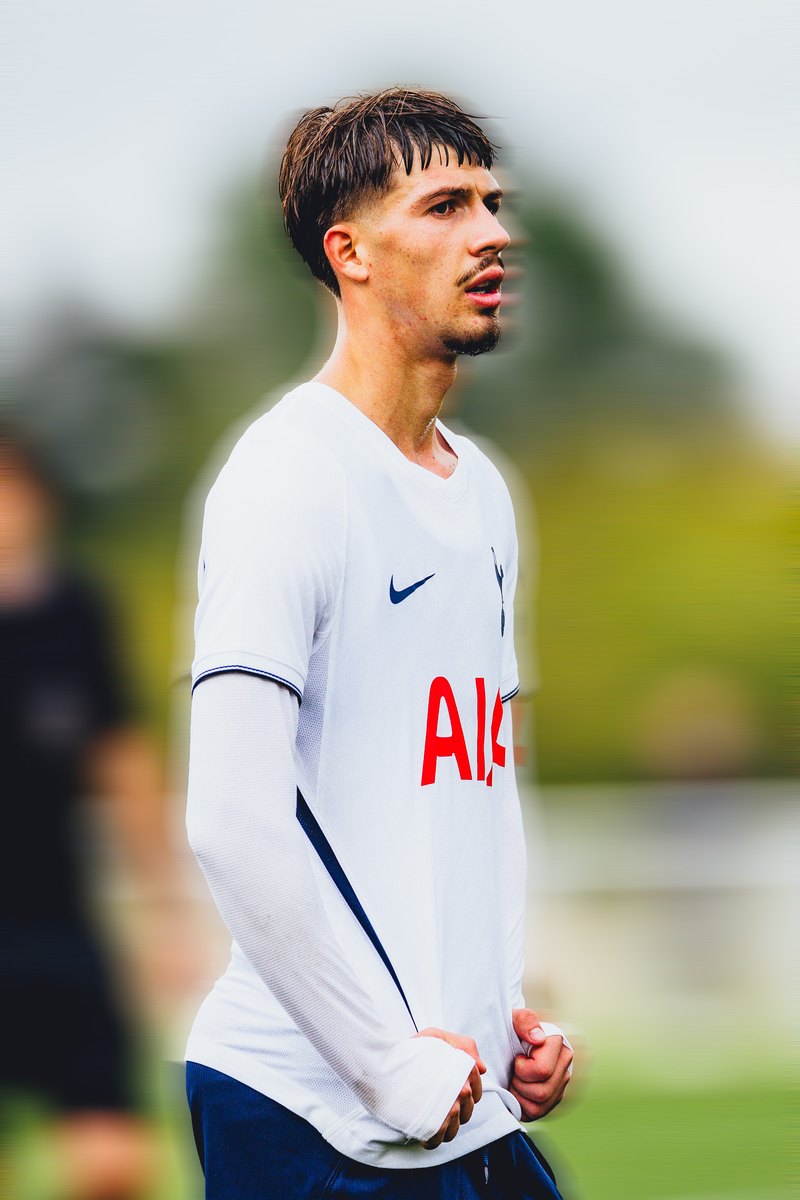Tottenham academy player in the white home kit, motion blur edit