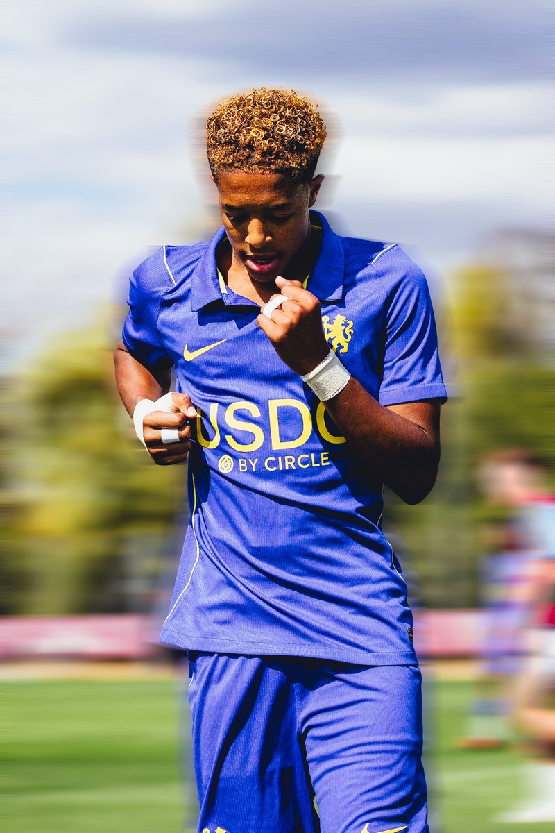 Chelsea academy player clenching his fist, motion blur edit