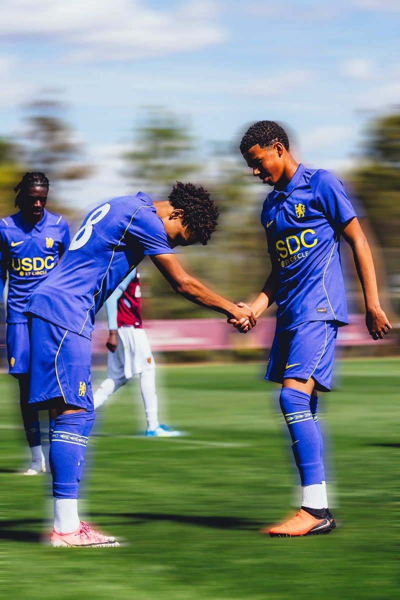 Chelsea players shaking hands, motion blur edit